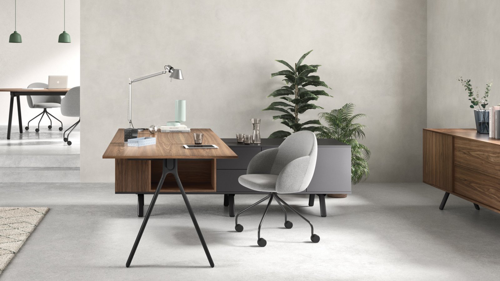 Bureaux design Lay d'Archiutti avec plateaux gris clair et structure rouge