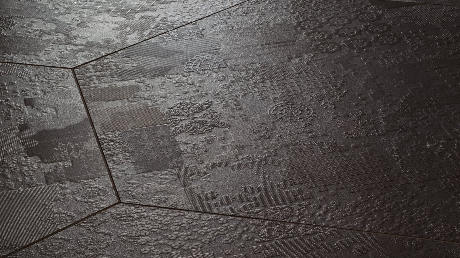 Sol en grès Déchirer de Mutina au bas-relief effet béton