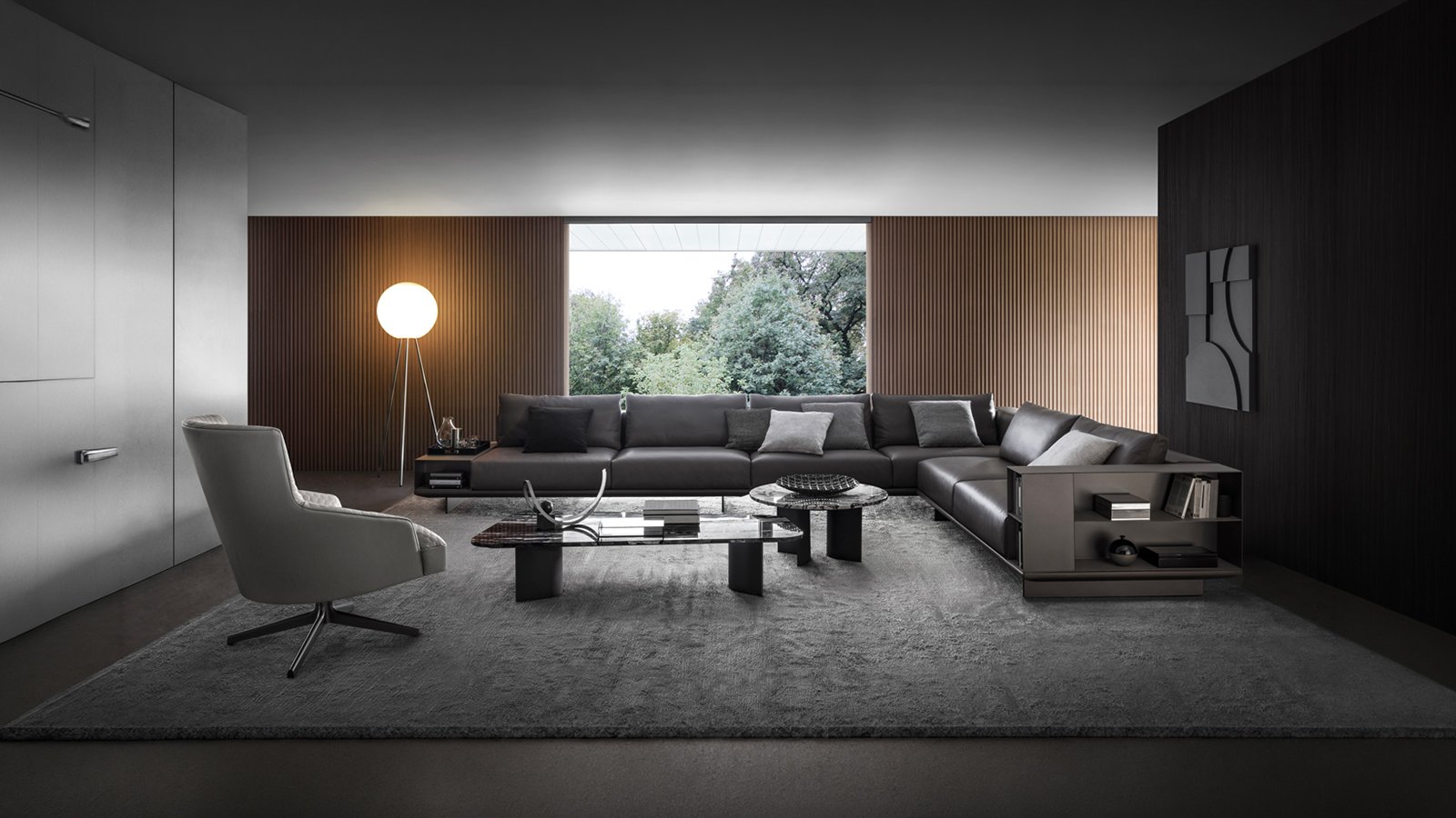 Canapé modulable Asso d’i4Mariani avec base en cuir et volumes en tissu