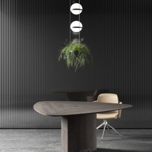 Insert de cuir à couture apparente sur la table Trilo