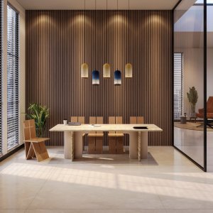 Angle arrondi du plateau en travertin de la table de réunion Ginza, design Barbieri Magalini