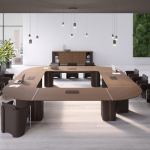 Fauteuil Coupè en cuir ajouré devant le bureau de direction AlfaOmega
