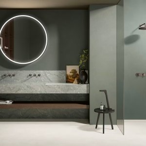 Paroi de douche Flora aux commandes alignées à la verticale sous une pomme ronde