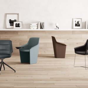 Détail du piquage matelassé artisanal ton sur ton du fauteuil Jera Chair