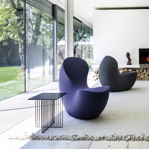 Base plate en feutre sous le fauteuil design Nautile