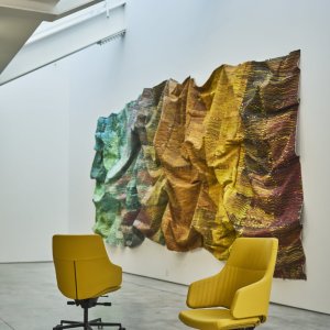 Coutures apparentes sur le dossier du fauteuil Italia